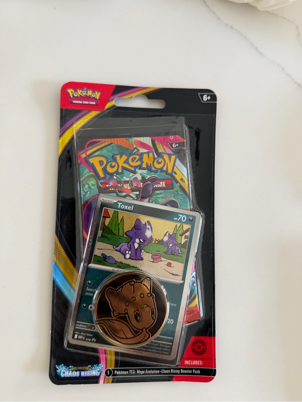 Pokemon Trading Card Toxel Blister Pack — Purple, Black, Teal